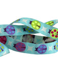 Painted Ladies on Aqua 5/8"- Glimmer Tula Pink Tiny Beasts- PER QUARTER METRE