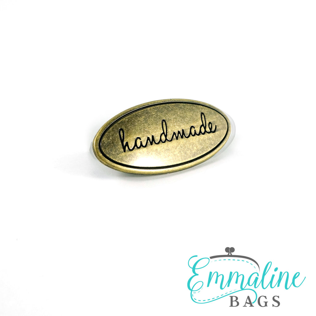 Metal Bag Label: Oval with &quot;Handmade&quot; - Antique Brass